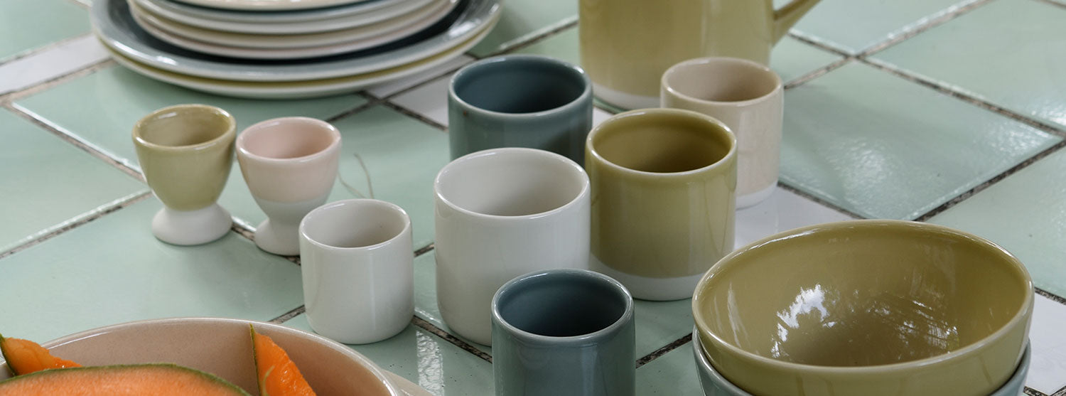 A group of cups and plates.